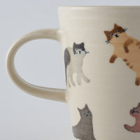 作家 大場紀穂子 ねこいっぱいのマグ